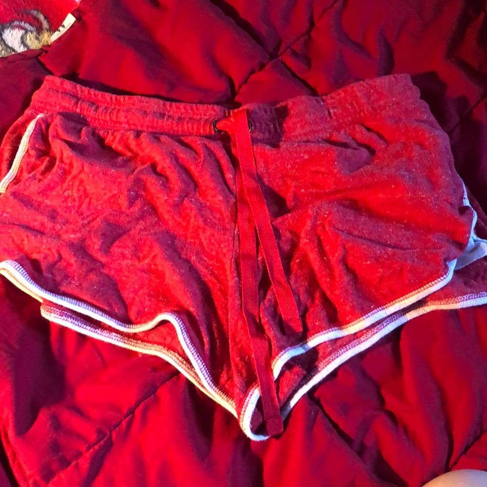 Red athletic shorts size XL